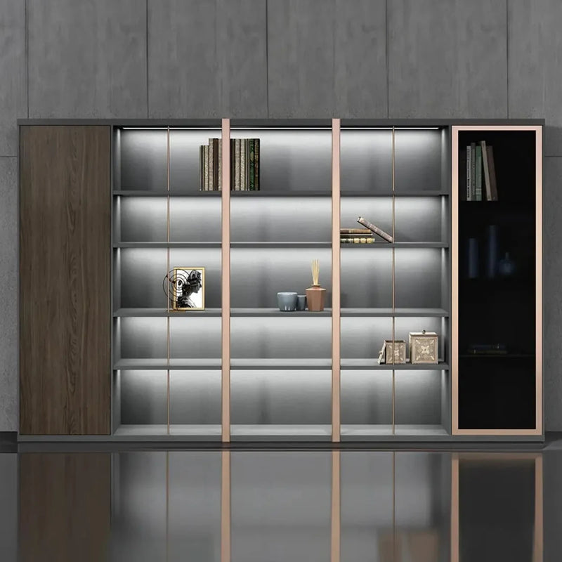 Keats 10′6″ (126-inch) office shelves with integrated lighting in a gray room, books and décor on the lit tiers