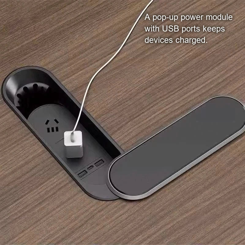 Close-up of the Chymé pop-up power module with a plug and USB ports on the dark oak top