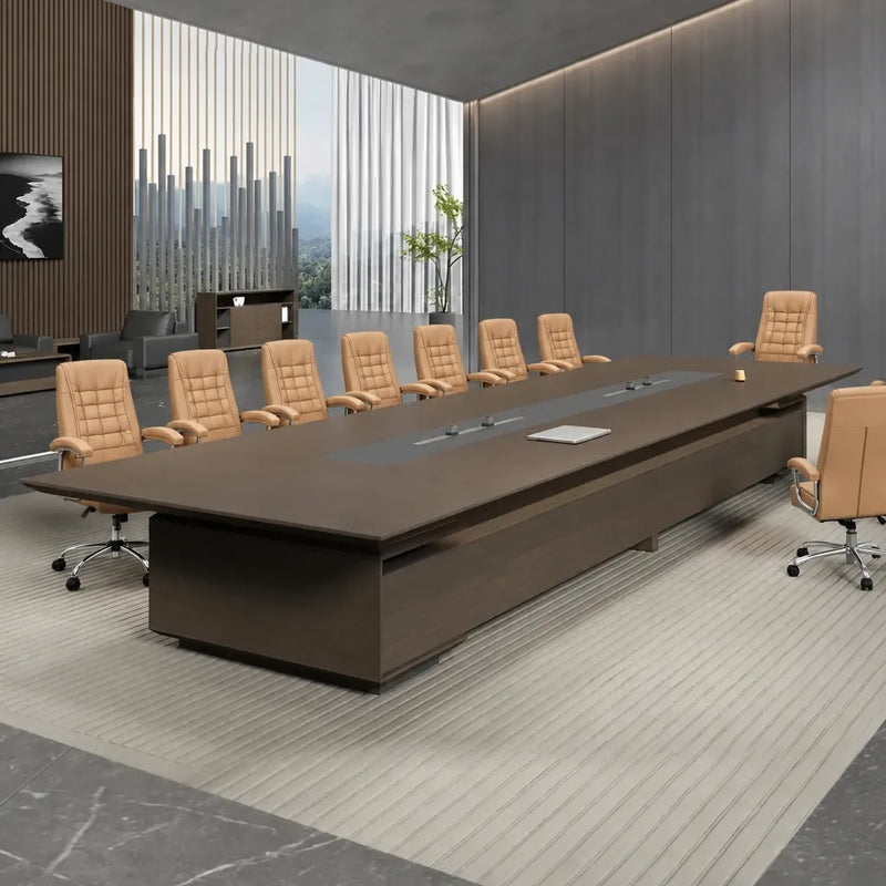 Hunter long conference table with tan leather chairs in a room with a slatted wood wall and stone floor