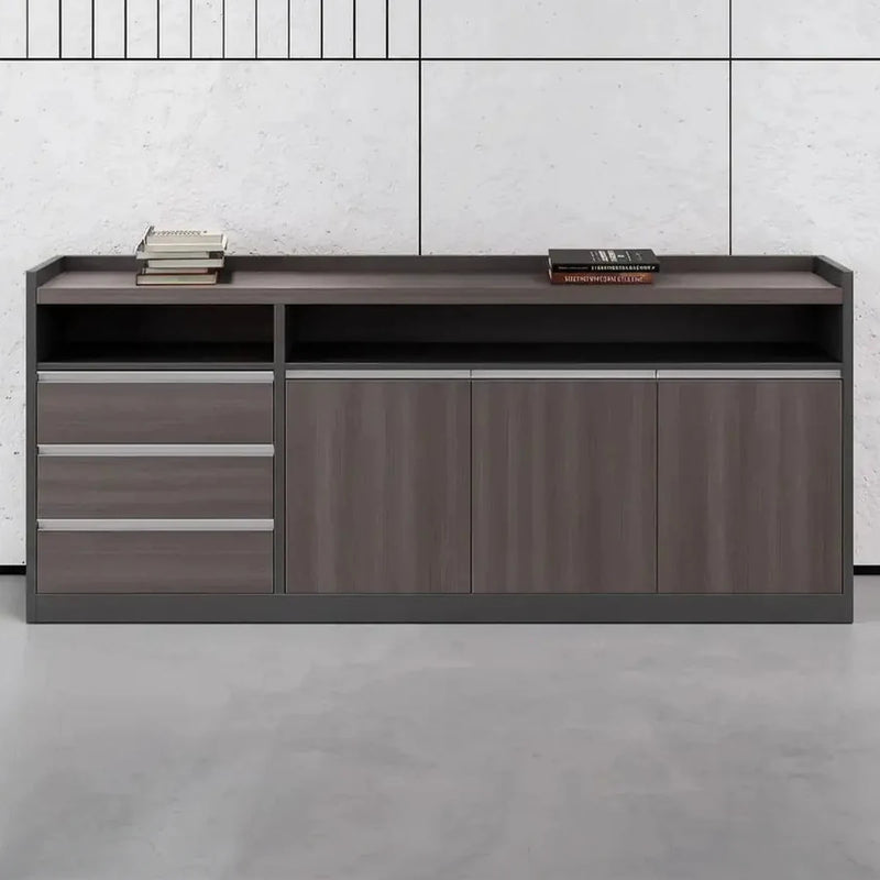 Barrow office credenza cabinet against a paneled wall, books on the open top shelf, gray oak finish