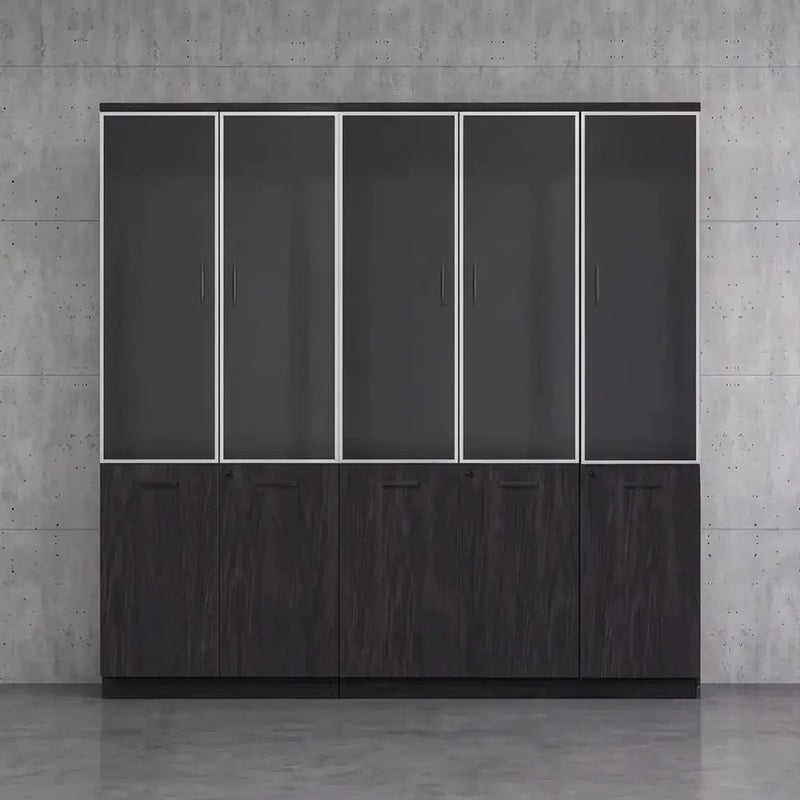 Ashcombe glass-front office cabinet against a concrete wall, five smoked glass doors and dark oak base