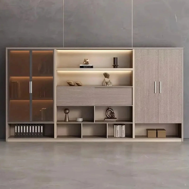 Hartwell 10′6″ (126-inch) office shelves with integrated lighting in a gray room, glass-door cabinet at the left, wardrobe at the right