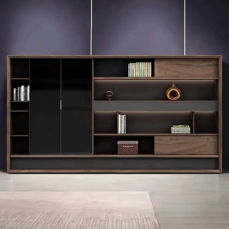 Chesham office shelves front view in a dark blue room, books on the walnut tiers, smoked glass cabinet on the left