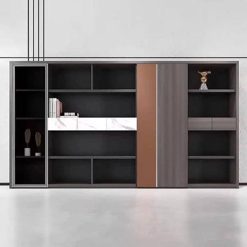 Penley 12′ (144-inch) office shelves front view in a gray room, books and vases on the black grid, copper closet panel