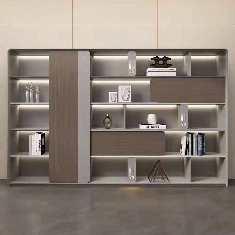 Keswick 10′6″ (126-inch) office shelves with integrated lighting in a beige room, books and décor on the lit tiers