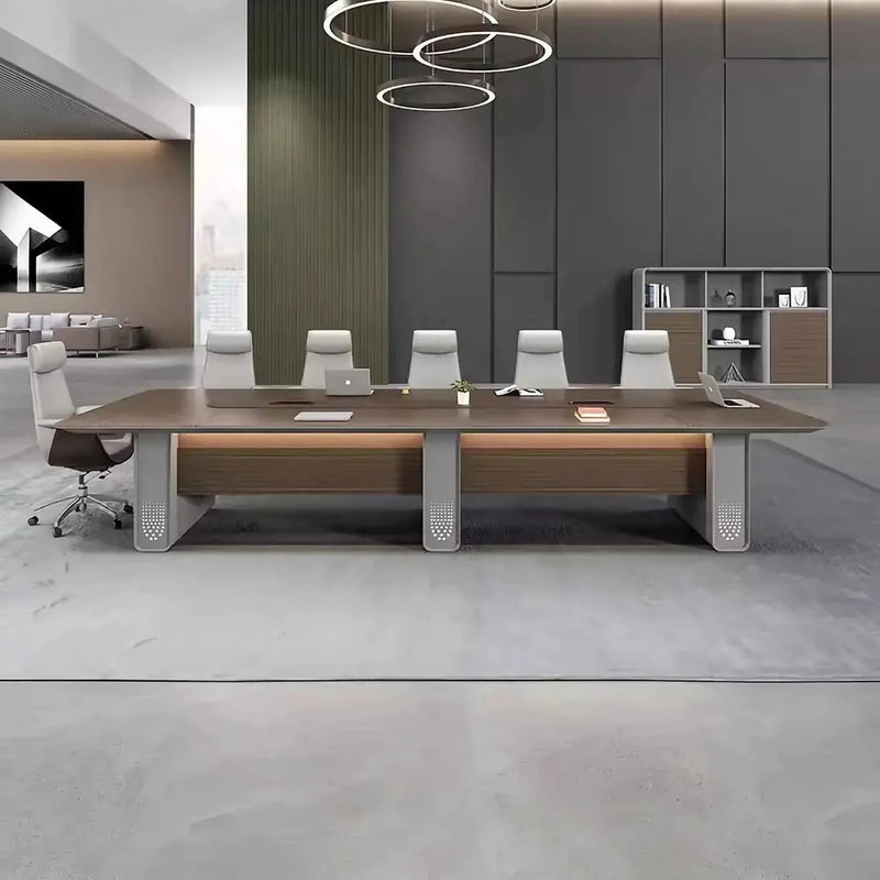 Kinsley 12′ to 15′9″ (144 to 189-inch) boardroom table with cream leather chairs beneath ring pendants