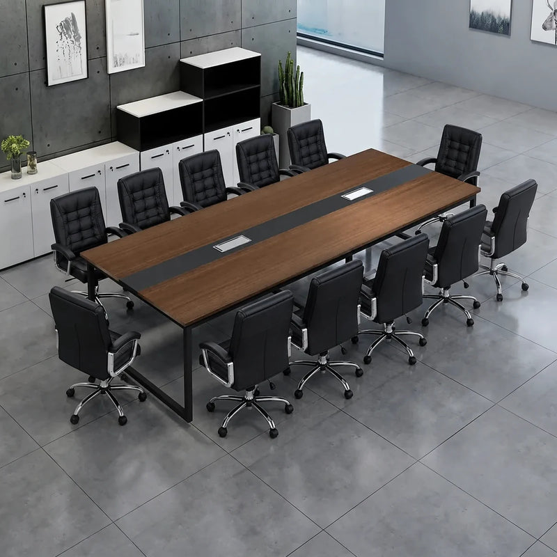Levan amber walnut meeting table with black leather chairs beside white and black storage cabinets