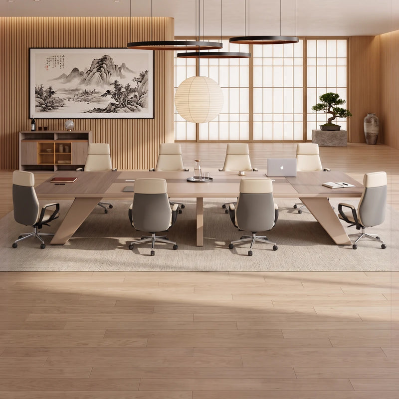 Lyric gray oak boardroom table with tan chairs beneath round pendants and a Manhattan skyline window