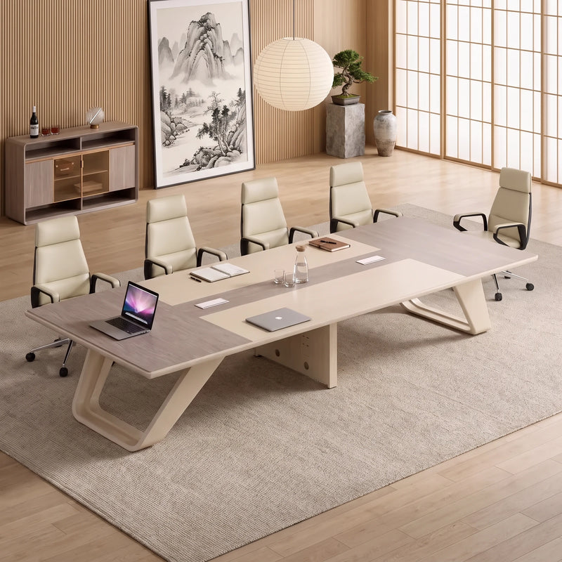 Lyric gray oak meeting table with five tan chairs and a credenza, angled overhead view
