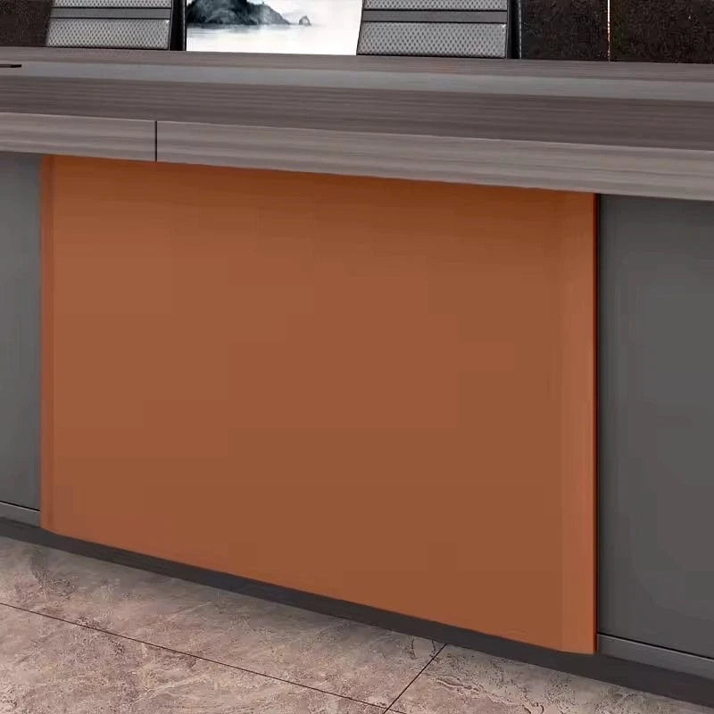 Detail of the Medley orange leather-look pedestal panel beneath the gray oak top