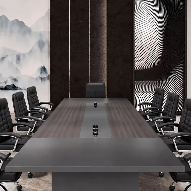 Medley conference table with black leather chairs viewed from the head, pop-up charging modules on the runner