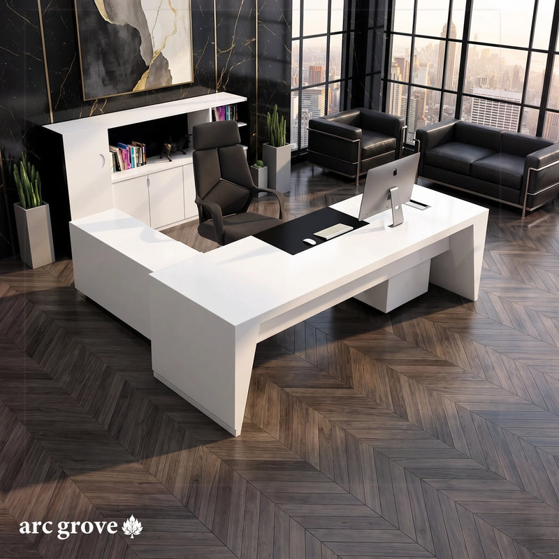 Newton white gloss L-shaped executive desk with a black desk pad in a black marble office