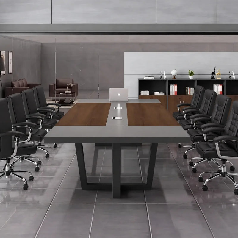 Oakburn professional conference table seating 12 in black leather chairs with storage cabinets behind