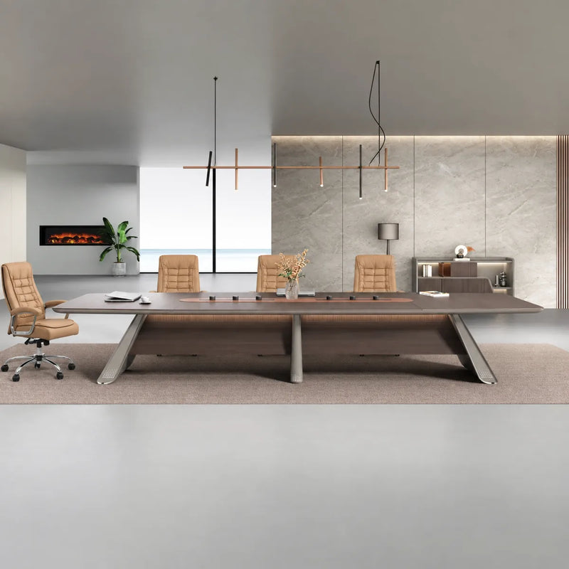 Parly conference table with tan chairs beneath a linear pendant against a stone feature wall