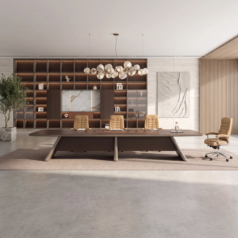 Parly oak conference table viewed straight on with a full-height shelving wall behind