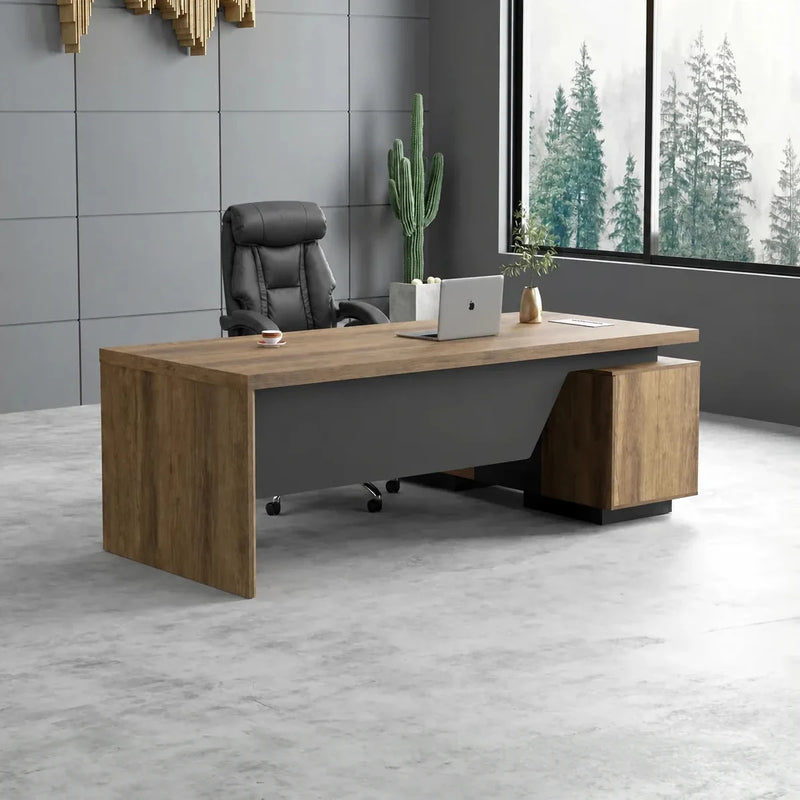 Pascal manager desk, left return, in a gray office with cactus