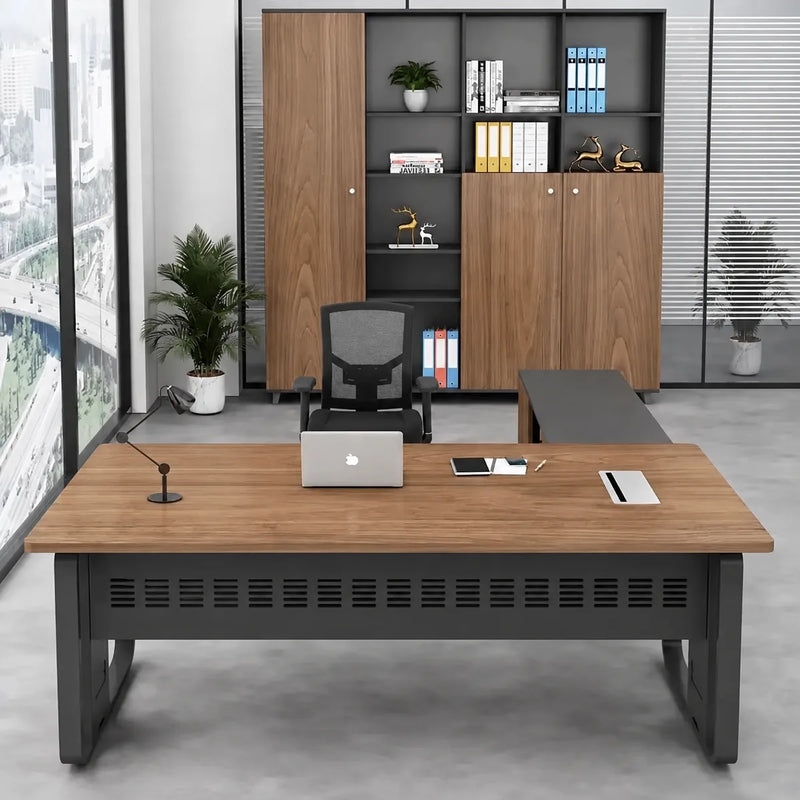 Patton desk in golden teak facing tall storage cabinets