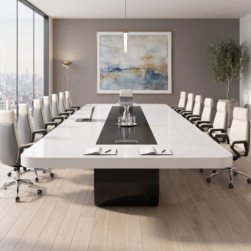 Paxum white executive conference table with white chairs, viewed straight on in a tech-style room