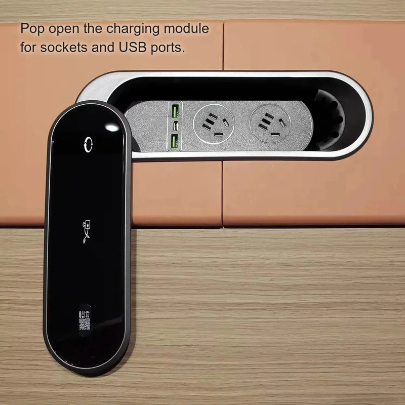 Unity pop-up charging module rotated open to show sockets and USB ports on the orange strip