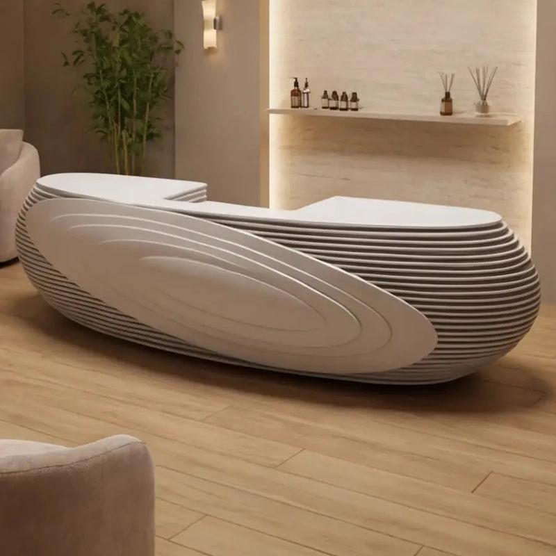 Avéra spa reception desk, right configuration, on warm wood flooring
