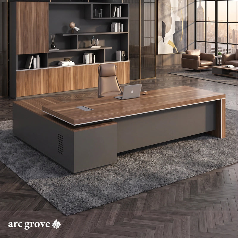Belford L-shaped executive desk in golden walnut with a charcoal gray body in a black marble office with brass trim