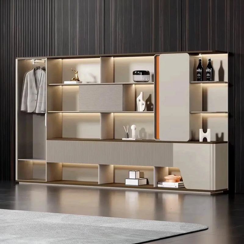 Harbord office shelves in a dark room, suit closet with hanging jackets at the left, integrated lighting on the tiers