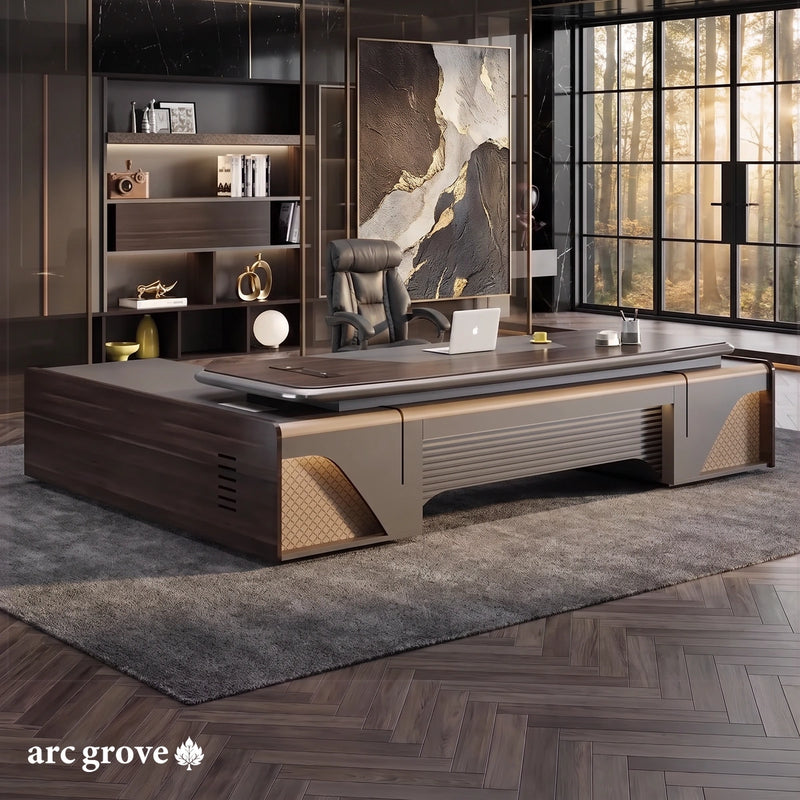 Stellan L-shaped executive desk in dark zebrano wood with tan quilted panels in a black marble office with forest windows