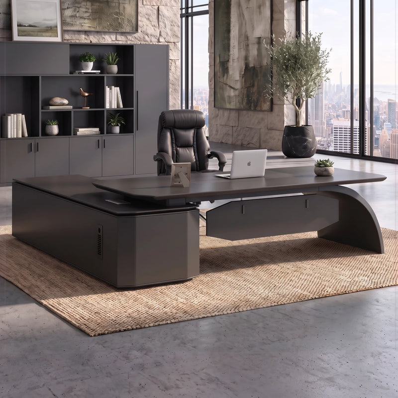 Ventura charcoal desk in a stone tower office with a city view