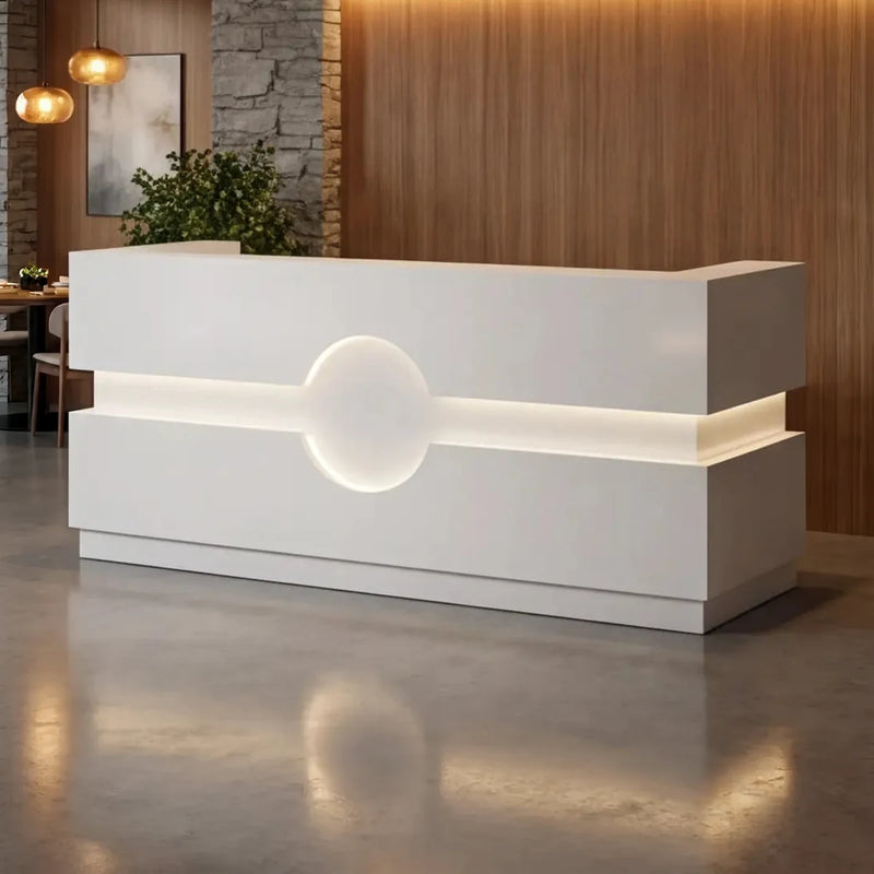 Liora desk angled between wood paneling and stone in a restaurant