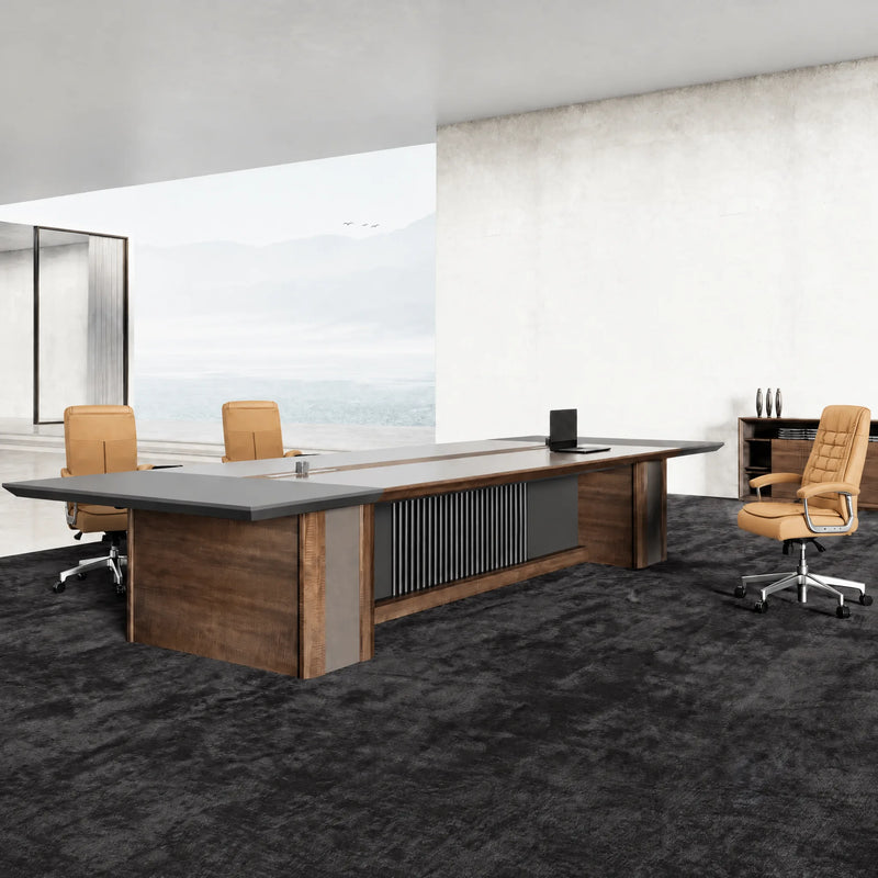 Westmere conference table in walnut with a tan leather chair and a window with mountain views