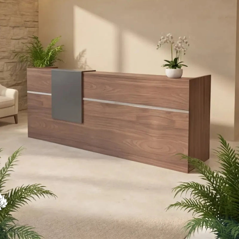 Ismere desk angled by a sandstone wall in a hotel lounge