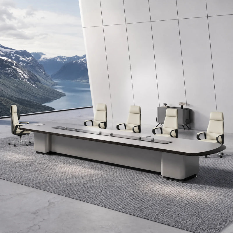 Zenith executive boardroom table seating 20, angled view with a fjord and mountain landscape outside