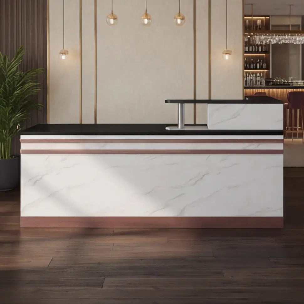 Marble reception desk under pendant lights in a hotel lobby