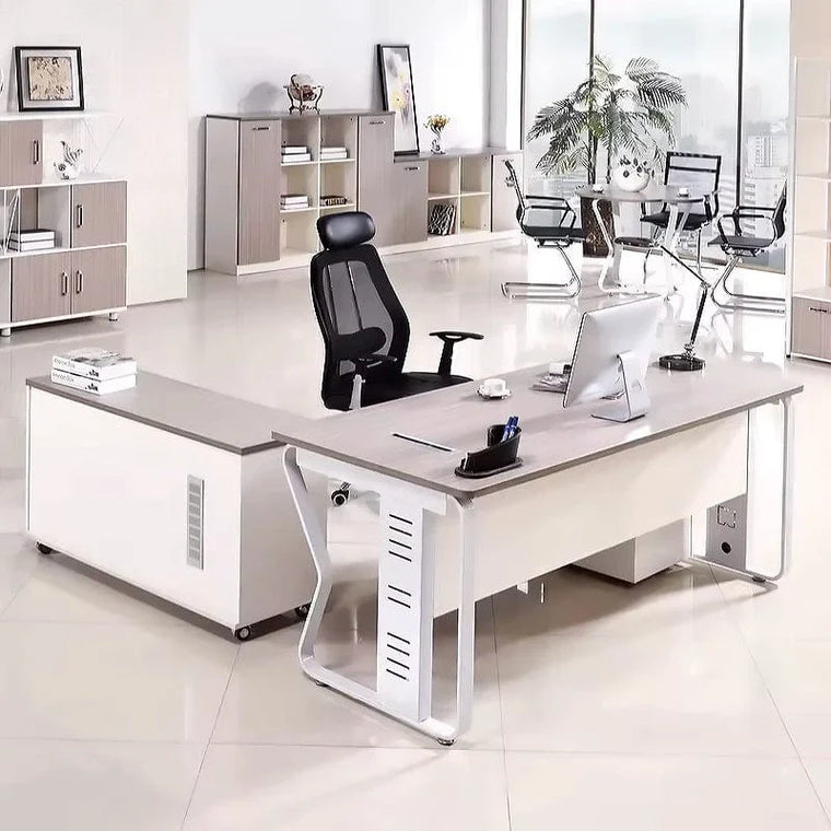 Tidy home office with a desk, mobile storage, shelving and a plant by a window