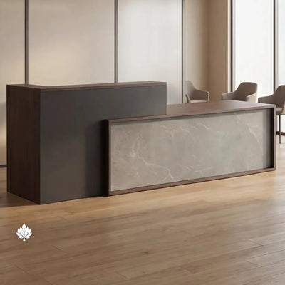 Tavelle desk angled beneath a linear pendant in a clinic