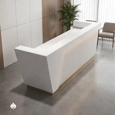 Elliora desk angled in a spa lobby with guest chairs