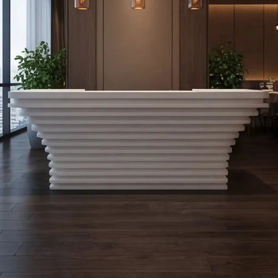 Dahlia front desk by floor-to-ceiling windows in a restaurant