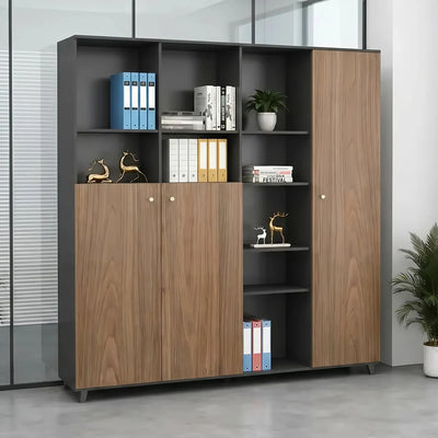 Hartley office bookcase angled view, teak doors closed, dark gray shelving grid with binders and a plant
