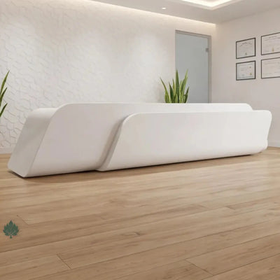 Auden reception desk angled in a bright medical office