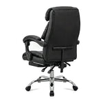 Wendell high-back executive office chair with footrest in black, back angled view