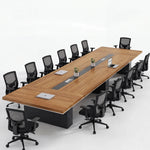 Long Accord conference table in walnut with black mesh chairs, seats up to 14 at 13′9″ (165 inches)