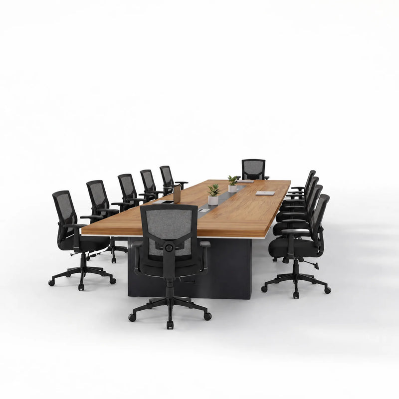 Accord walnut conference table viewed from the end with black mesh chairs