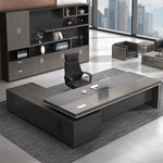 Gray oak Acumen executive desk with right return in a high-rise CEO office with wall storage