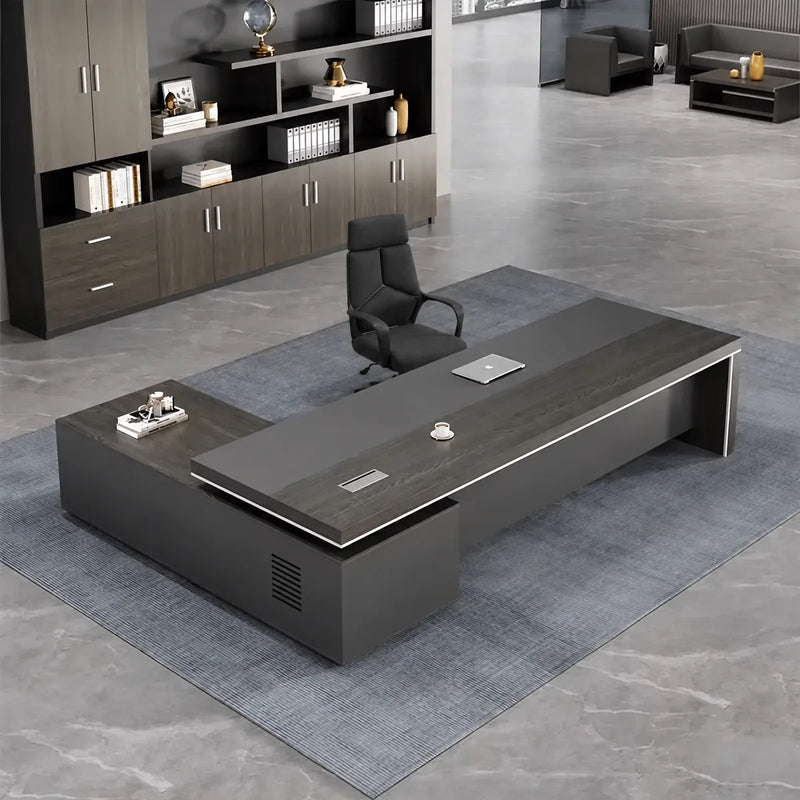 Acumen L-shaped desk in gray oak in a corner office, viewed from above