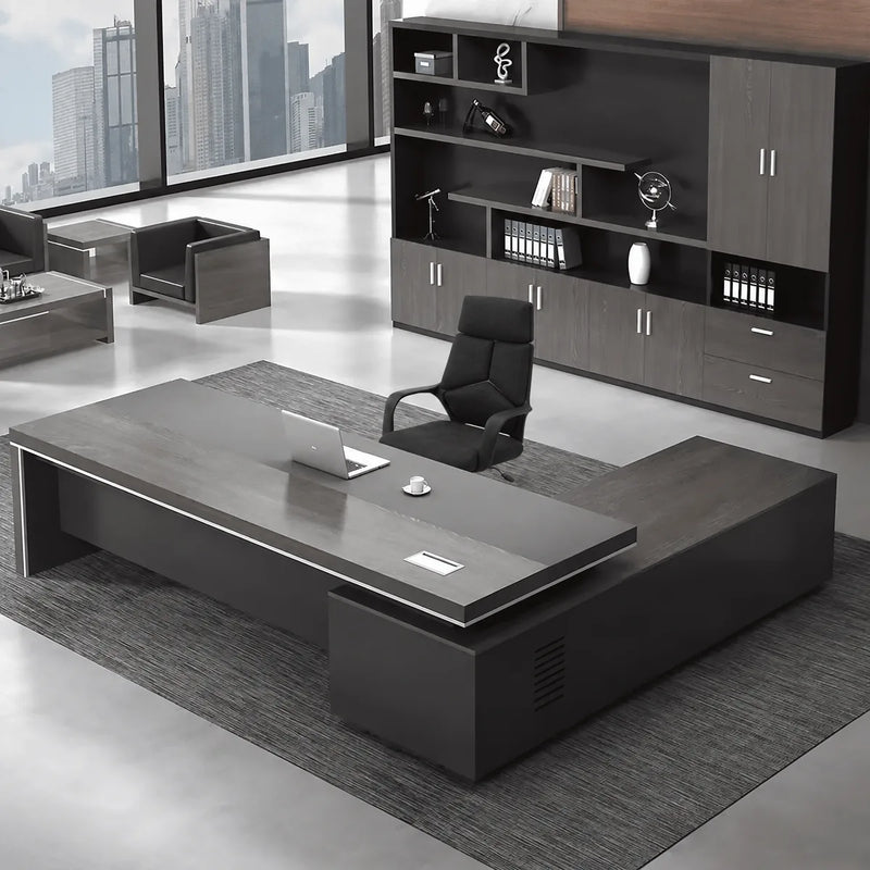 Acumen executive desk in gray oak, left return configuration, in a downtown corner office