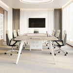 Affney collaborative meeting table with eight ivory mesh chairs in a bright conference room with a wall display