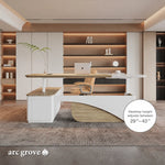 Albion desktop raises and lowers between 29″ and 43″, shown in a designer office