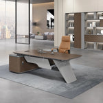 Aldiss L-shaped desk with gray accent panel in a bright modern office