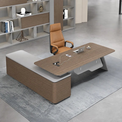 Aldiss manager desk in brown and gray, right return, beside open shelving in the workspace