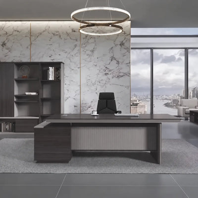 Allard desk with right return in a marble-walled lawyer's office overlooking the city
